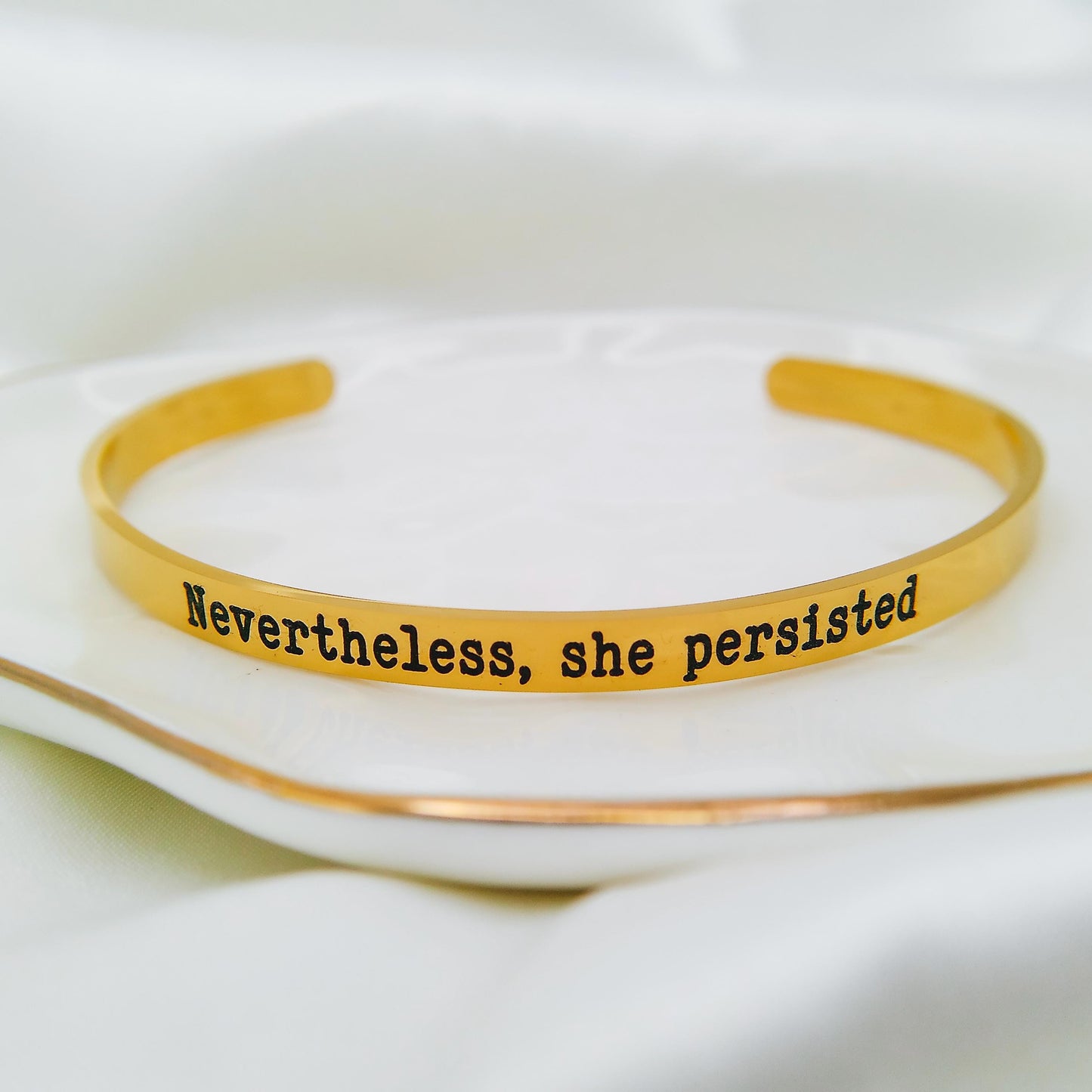NEVERTHELESS SHE PERSISTED CUFF