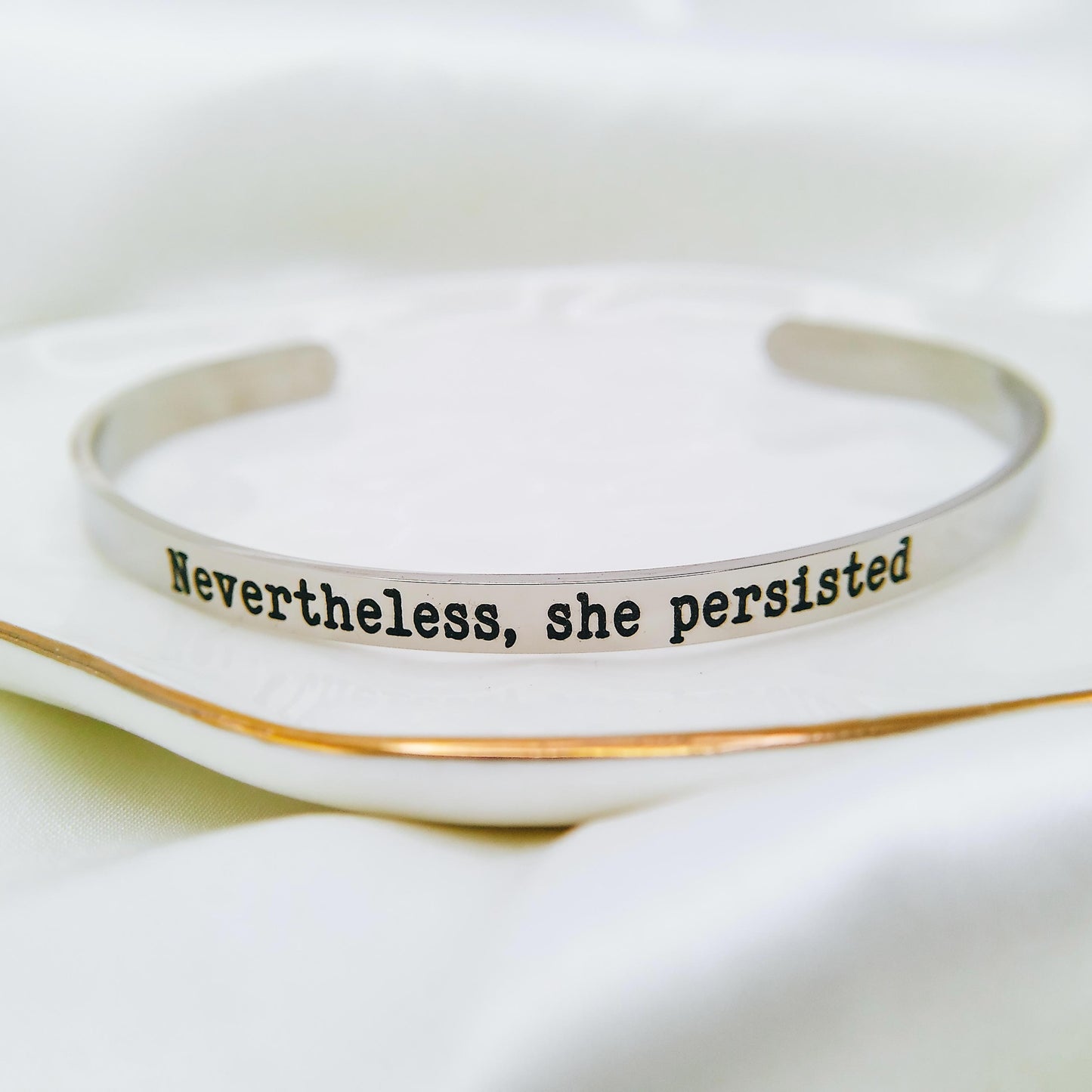 NEVERTHELESS SHE PERSISTED CUFF