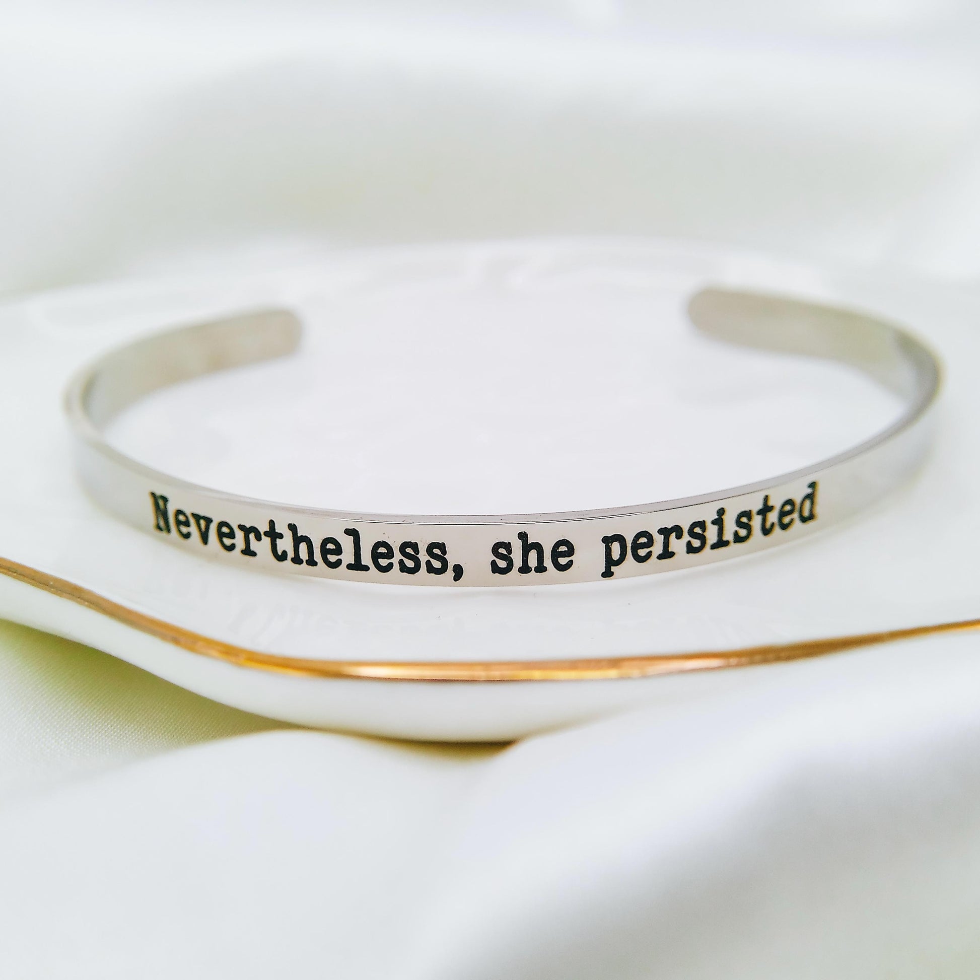 NEVERTHELESS SHE PERSISTED CUFF