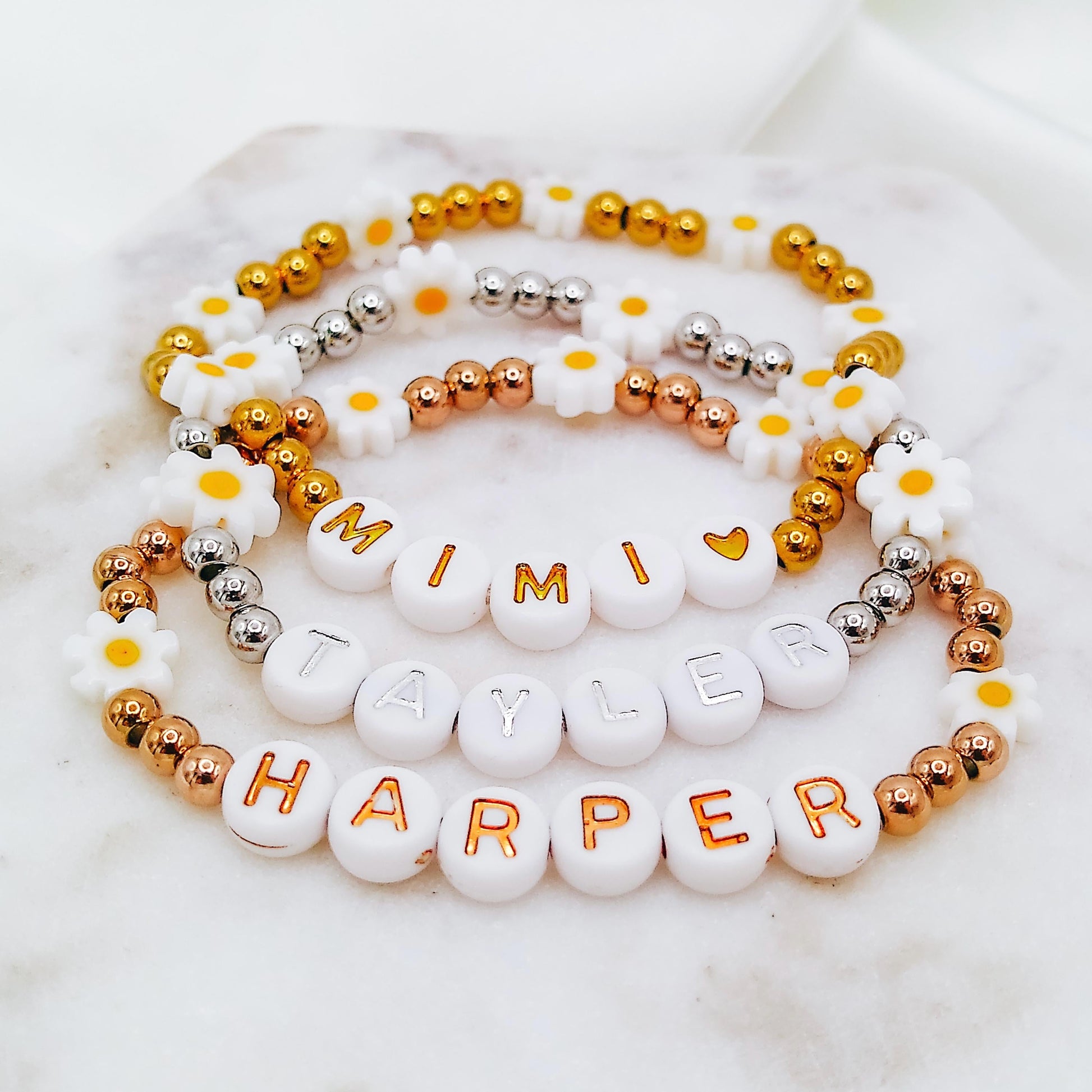 METAL BEADED DAISY WORD BRACELET - Avy + Tay